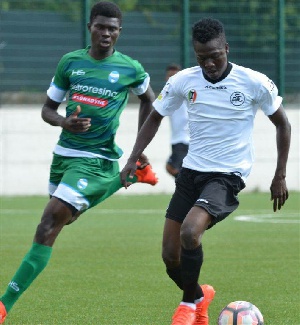 Shaka Mawuli Eklu (in green jersey).