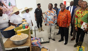 President Akufo-Addo ringing the bell to inaugurate the Ghana Commodity Exchange