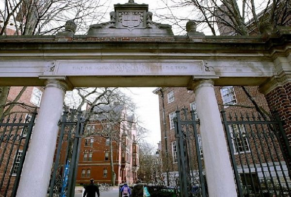 In this Dec.13, 2018, a gate opens to the Harvard University campus in Cambridge, Mass. Photo: AP