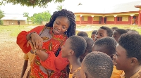 Ivy Kesewaa Nkrumah interacting with some pupils