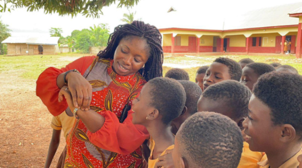 Ivy Kesewaa Nkrumah interacting with some pupils