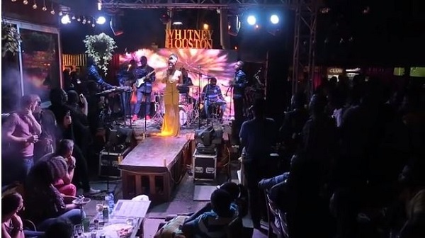 Efya performing at the Zen Garden Tribute to Whitney Houston event
