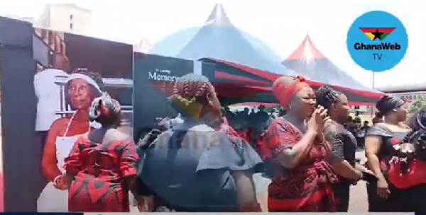 Some mourners captured at the funeral