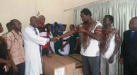 A representative from Asantewaa Boy's Foundation donating the incubators to the hospital