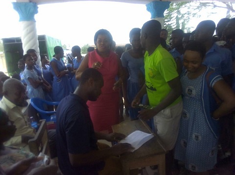 Queenstar Sawyer, MP for Agona East (in a pink dress) with the final year students