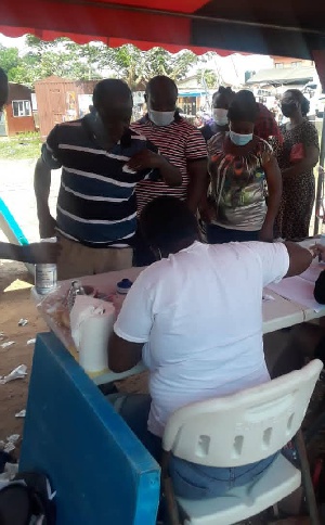 Mr Albert Osei Wusu, a pensioner casting his vote