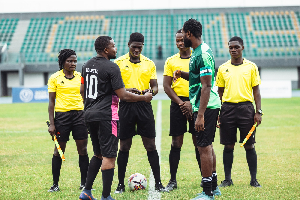 Telecel and Wilmar captains engaged refereeing officials before the game