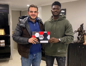 Ghanaian midfielder, Kwame Bonsu with a club rep