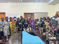 Akosua Nelly with some patients, others in a group photo