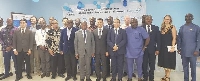 Mr Kwaku Agyeman Manu (seventh from right) with the team after signing the MoU