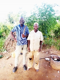 The regional chairman of the peasant farmers association of Ghana, Salifu Amadu (left)