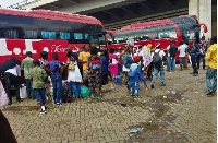 Travelers boarding a bus