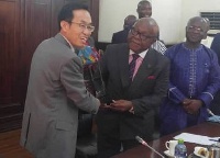 Chinese Ambassador to Ghana with Speaker of Parliament, Prof Mike Oquaye.