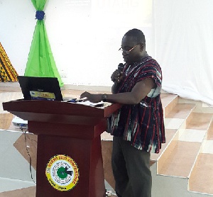 Dr. Ebenezer Appiah-Denkyira speaking at the event