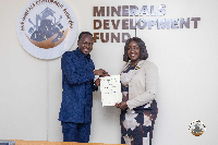 Dr Prosper Akaba with Dr Hanna Louisa Bisiw-Kotei after the signing