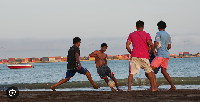 People play football on a beach in Praia, Cape Verde, 7 May 2026
