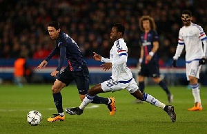 Baba Rahman in action against PSG