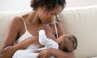 File photo of a breastfeeding mother and a baby