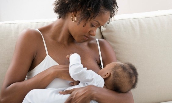 File photo of a breastfeeding mother and a baby