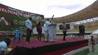 Alhaji Ibrahim Mobila behind the podium