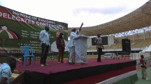 Alhaji Ibrahim Mobila behind the podium