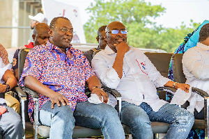 Dr Mohammed Amin Adam with Bawumia at a function