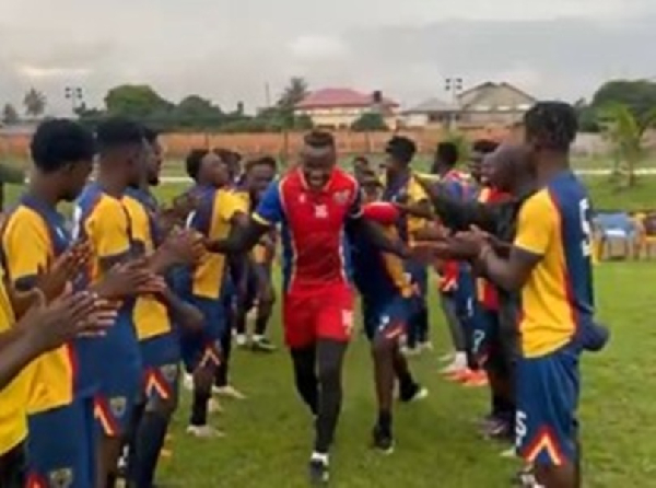 Benjamin Asare (M) received applause from his Hearts of Oak teammates