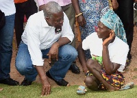 Vice President, Paa Kwasi Bekoe Amissah-Arthur with a disabled person