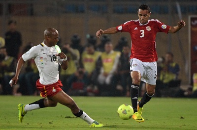 Egypt?s Ahmad al-Shenawy vies for the ball with Ghana's Andre Ayew during their the WC2014 Africa