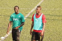 Asamoah Gyan training on Stade Said Mohamed Cheikh pitch.