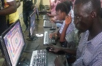 Some of the children trying their hands on the computers