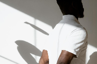 A file photograph showing a man with his back turned to the camera