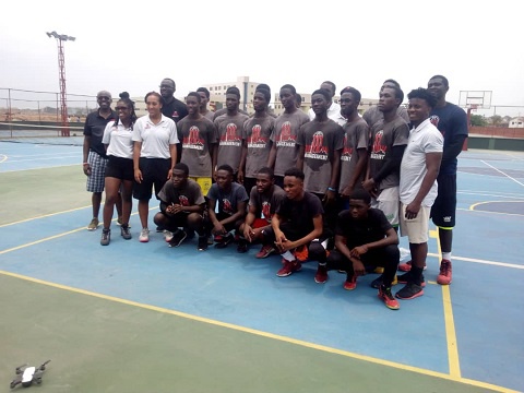 Officials of Rozaay Management in a group picture with some of the students