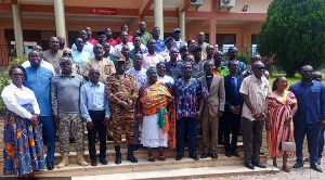 Participants of the training post for a photo