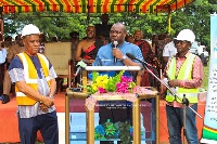 Sports Minister, Isaac Asiamah (middle), addresses the people of Dormaa