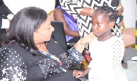 Rebecca Akufo-Addo with the little Harriet