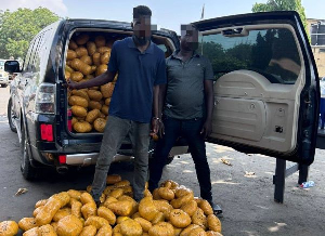 The two suspects drove the vehicle fully packed with compressed yellow-wrapped parcels