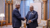 Sudanese leader, Abdel Fattah al-Burhan (L) shakes hands with Djibouti President, Ismail Oguelleh