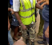 The video shows several traders in a standoff with some KMA taskforce officers