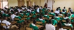 Some nursing training students seated in an examination hall