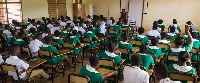 Some nursing training students seated in an examination hall