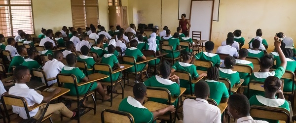 Some nursing training students seated in an examination hall