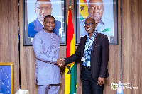 New CEO of GRIDCo, Frank Asirifi Otchere (R) with the Deputy Energy Minister, Richard Gyan-Mensah