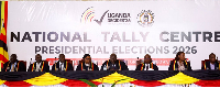 EC Chairperson Justice Simon Byabakama sits with other Commissioners to announces initial results