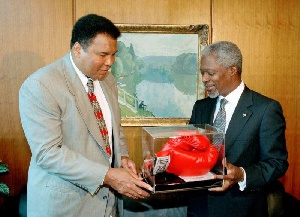 File photo: Muhammad Ali [L] receiving an award from Kofi Annan