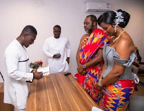 Viral photo of NAPO and wife being blessed at a church
