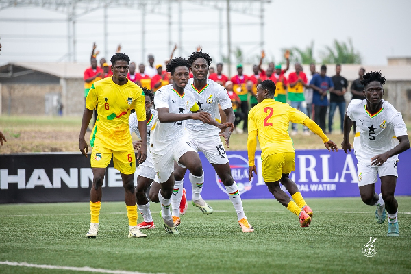 Ghana in white, beat Benin in yellow, to progress to the semis of the tournament
