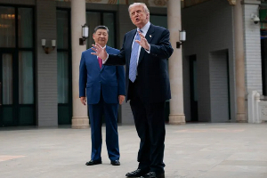 Donald Trump poses with Xi Jinping in Beijing