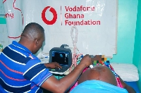 An pregnant woman getting screened