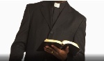 Pastor Holds Bible9